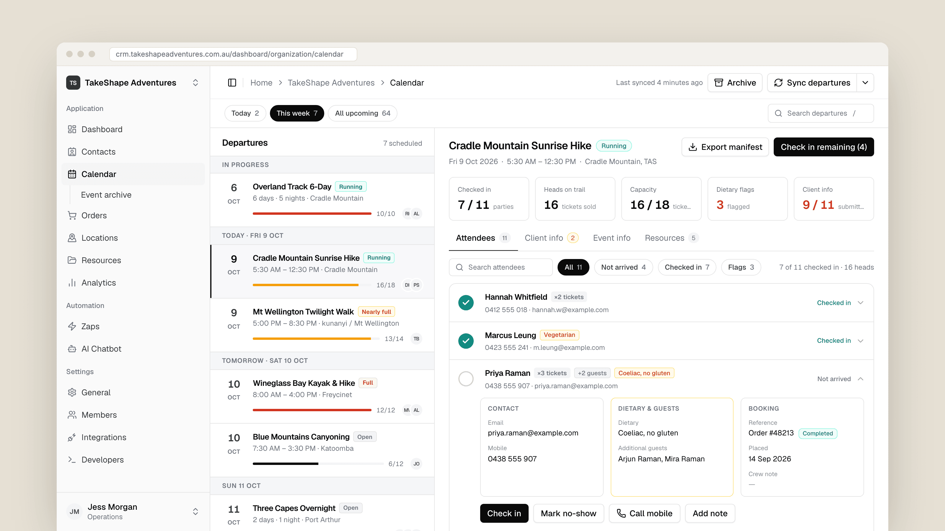 The calendar workspace: upcoming departures grouped by day with capacity bars on the left, and today's sunrise hike open on the right with check-in stats and an attendee manifest, one party expanded to show dietary needs and booking details.